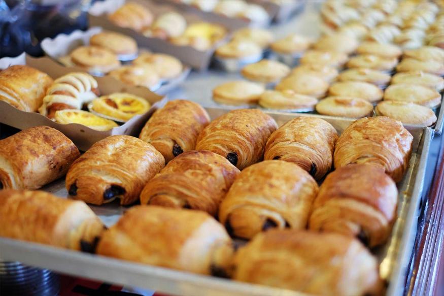 Trays full of baked goods at a bakery