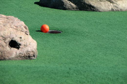 Golf Ball Going in Hole