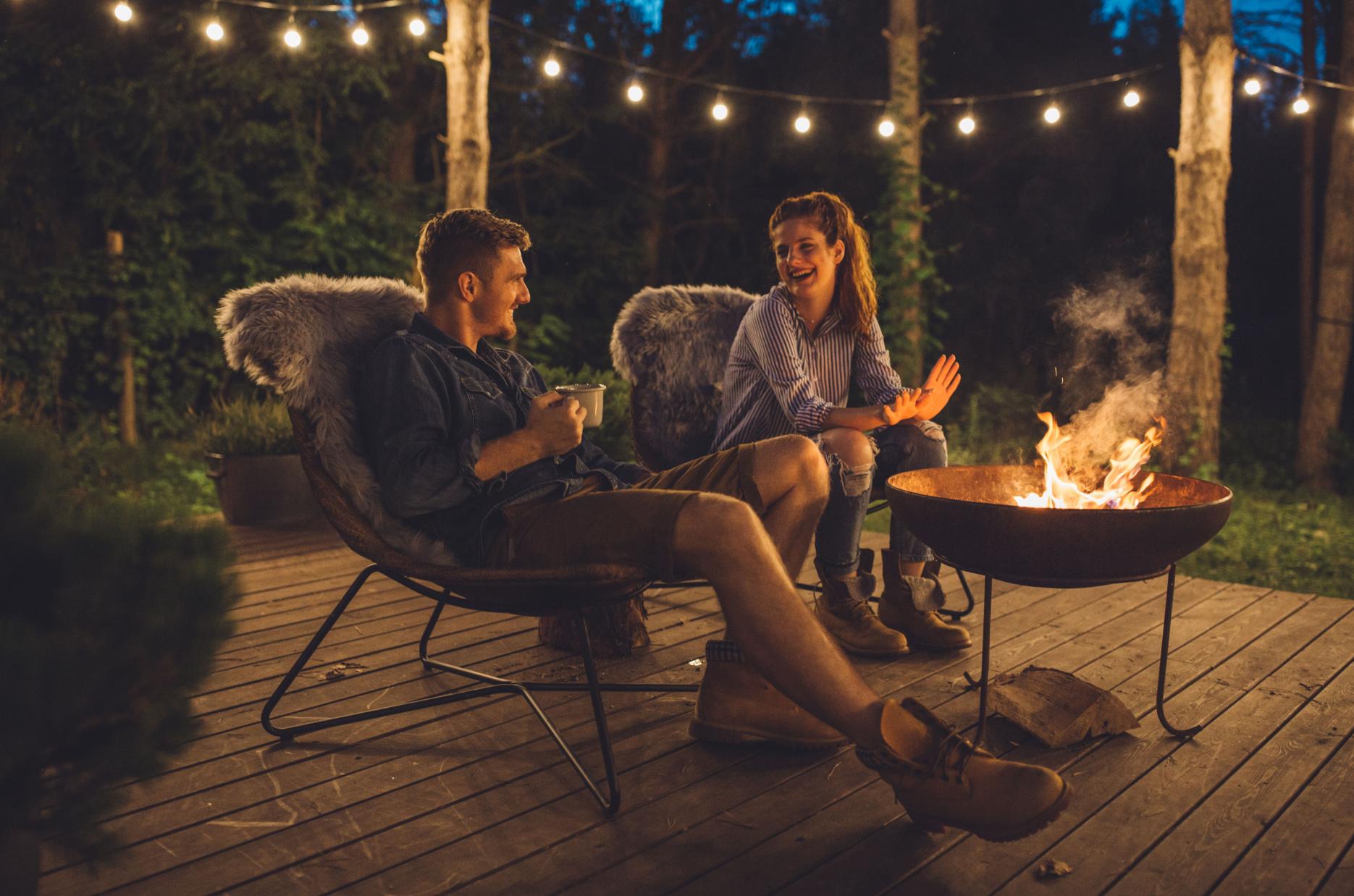 couple enjoying a warm fire
